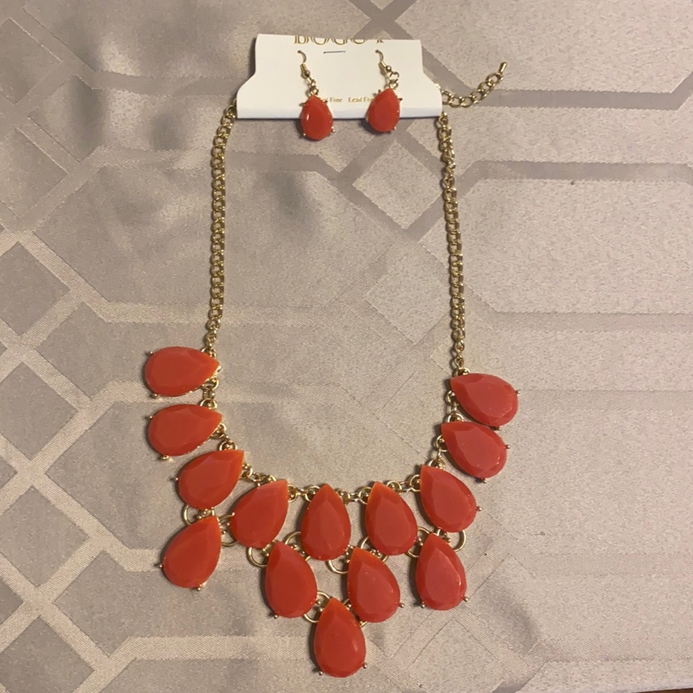 Orange statement necklace with earrings